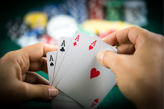 Holding ace cards