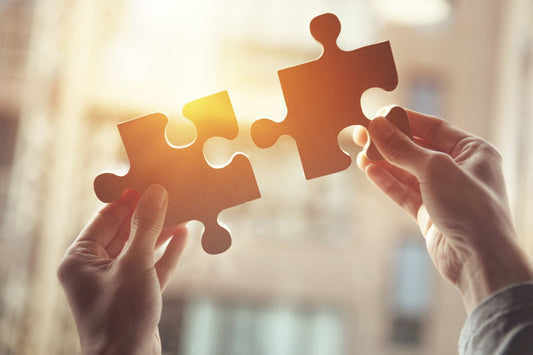 putting two pieces of puzzle together