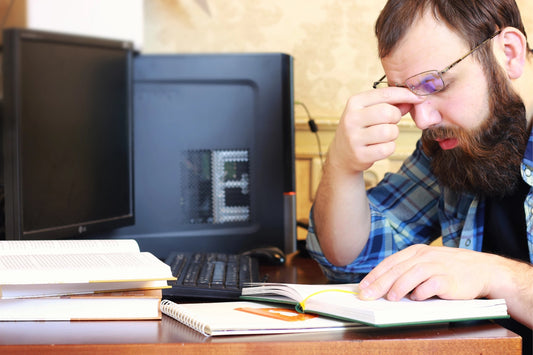 doctoral student deeply engaged in research